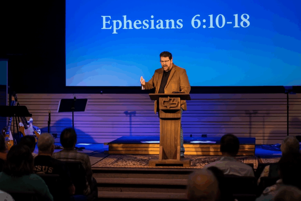 Image of Pastor Doug Snow on stage.